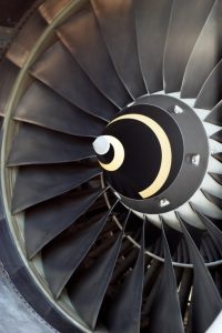 airplane part, closeup of jet engine turbine blades